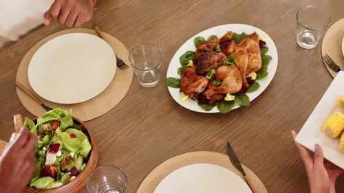 Family Meal with Roasted Chicken and Fresh Salad
