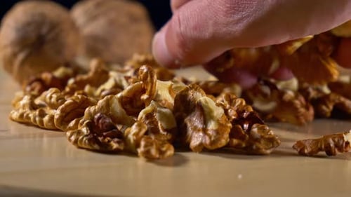 Walnuts On Wooden Plate 2K