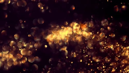 Golden Sparkles and Flares on a Dark Background