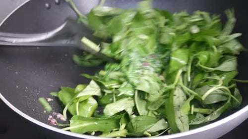 Fresh Green Vegetables Stir-Frying in a Pan