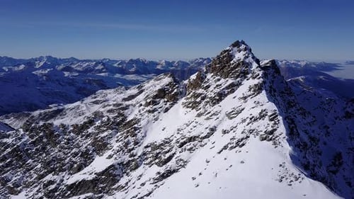 Aerial flight above stunning Alps.
