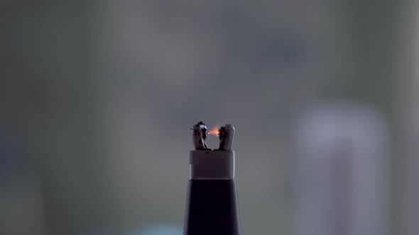 Electrical lighter, lighting up and being turned off, leaving small ...