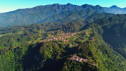 Scenic view of the beautiful village situated on the valley on mountain top.