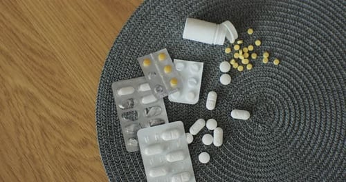 Pills and Medicine on a Decorative Mat