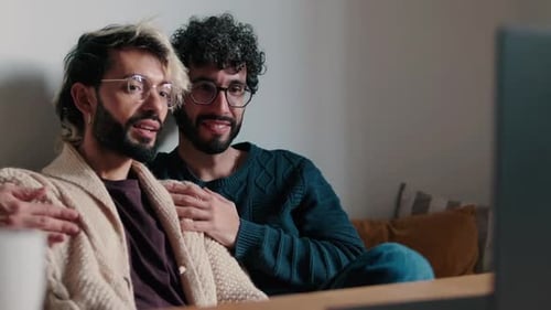 Intimate Couple Together on Sofa