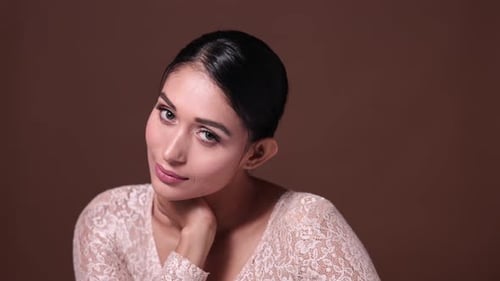 Woman Posing in Fashionable Lace Top