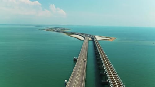 Top view of beautiful bridge over blue sea