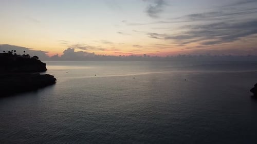 sunrise flight over a beach