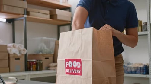 Female Employee Collecting and Packing Groceries to Order at Dark Store