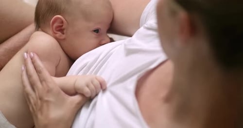 Close Up of Mother Breastfeeding Infant