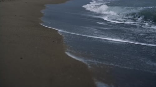 Blue Waves Crashing Sea Shoreline on Sand Beach Landscape. Close Up Ocean