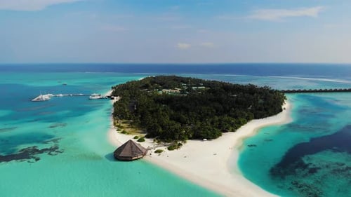 Luxury Resort Island In The Ocean. Maldivian Island With Bungalow On The Water