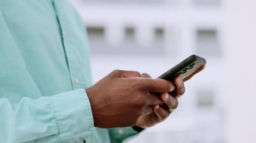 Phone, hands and black man typing outdoor for communication with 5g network connection in city