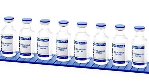 Coronavirus vaccine vials on production line