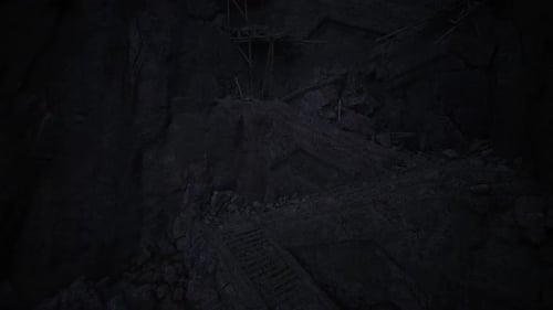 Deep Fissures and Mineral Streaks Cast Dramatic Shadow Patterns on Surface