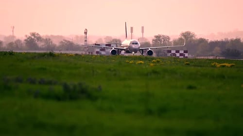 Huge Airplane Jet Maneuvering After Landing at International Airport Landing Zone at Beautiful