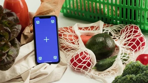 Food Shopping Delivery Online Shop Application Smartphone with Blue Chroma Key Screen and Fresh