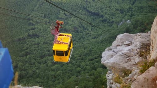 Funicular Goes Down to the Forest on Cable