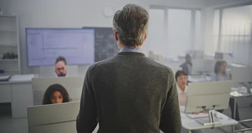 Adults Working in Computer Classroom Environment