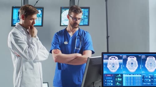 Professional Medical Doctors Working in Hospital Office Using Computer Technology Medicine