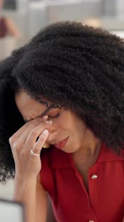 Eye strain, woman and burnout in office with migraine, headache or stress