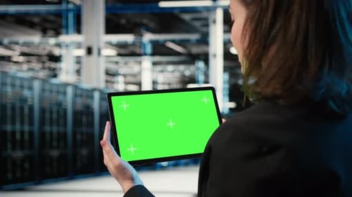 Isolated Screen Tablet IT Infrastructure and Software Developer in Data Center