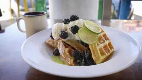 Delicious Waffles with Ice Cream and Blackberries