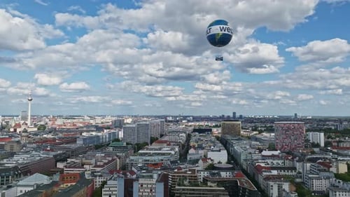 Aerial view revealing The Berlin Weltballon in Berlin city centre on a sunny day