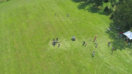 An Aerial View of a Civil War Cannon being fired at a Civil War re-enactment