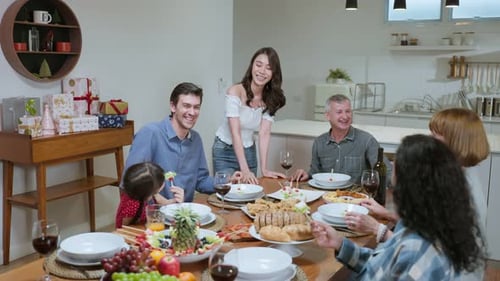 Family Celebrates Together at Home Dinner