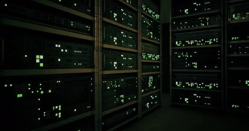 Servers Operate in a Data Center with Illuminated Indicators at Night
