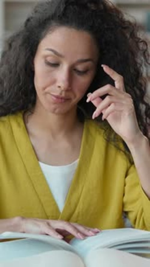 Latin Hispanic Woman Reading Book Tired Studying in Library Preparing Exam Female Girl Lady Student