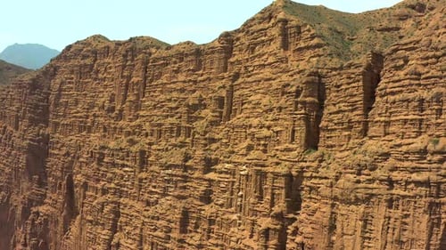 Red sandy canyon aerial view. Sandstone Mountain. Martian Landscape.