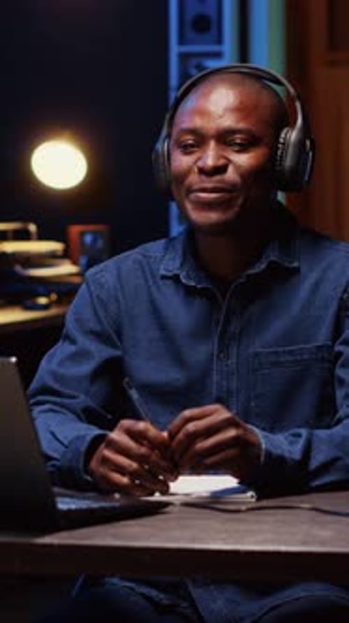 Vertical Video Content Creator Using Outlined Ideas on Notebook to Film Vlog Channel Intro