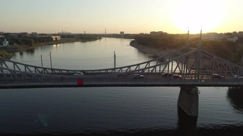 Aerial View of the Road Bridge Across the River at Sunset Beautiful Cityscape