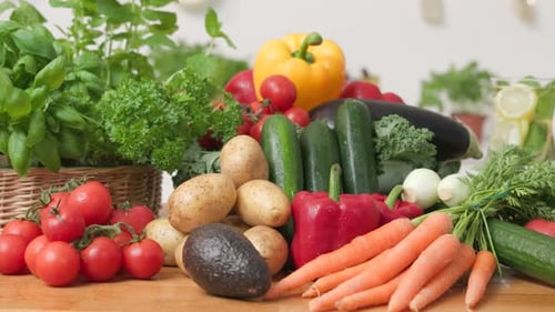 Fresh Vegetables Pile on Wooden Table