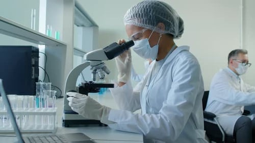 Biracial Chemist Studying Probe in Lab