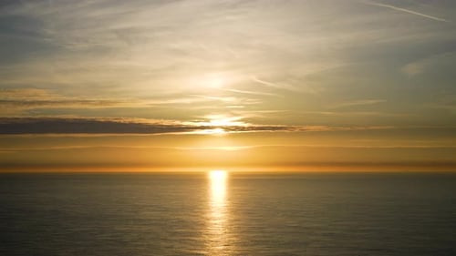 Cinematic View of Amazing Sea Scenery During Sunset on Coast Bright Sunlight Shining Through