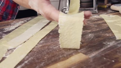 Woman Prepares Fresh Pasta in Home Kitchen
