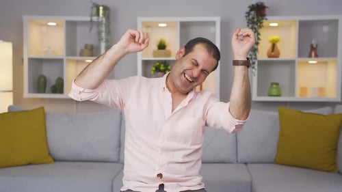 Happy man dancing.