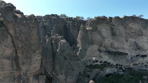 Flight Over Steep Huge Cliffs And Caves
