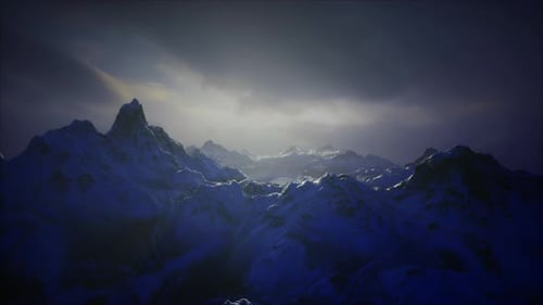 Majestic Mountain Landscape Captured at Twilight with Deep Blue Hues