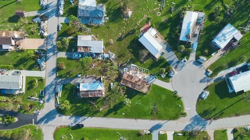 Severely Damaged Houses After Hurricane Ian in Florida Mobile Home Residential Area Consequences of