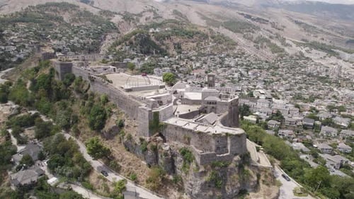 Aerial Panoramic of Castle of Gjirokastra above old city, south Albania