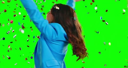 Face, success and woman with confetti, green screen and celebration with happiness