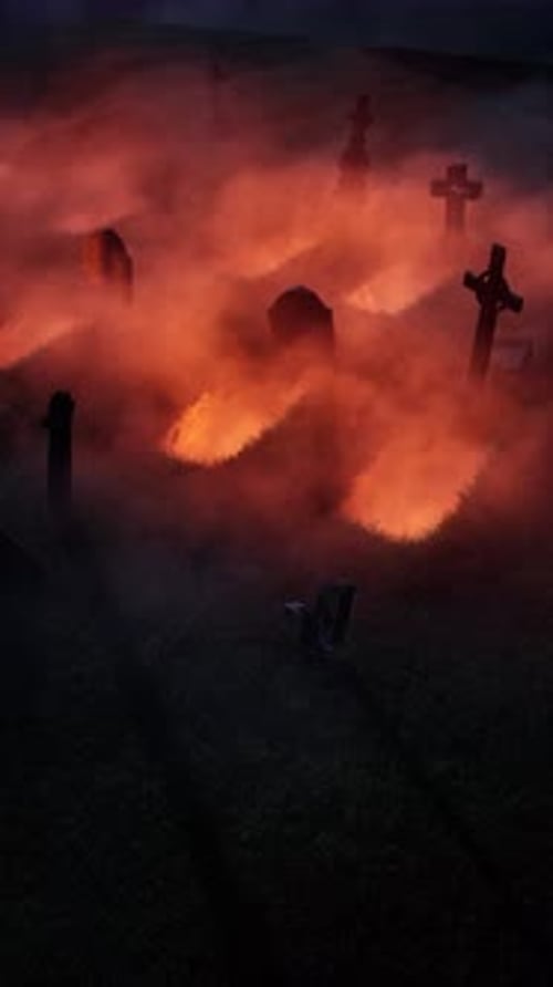 An old, abandoned cemetery with headstones jutting out in all directions