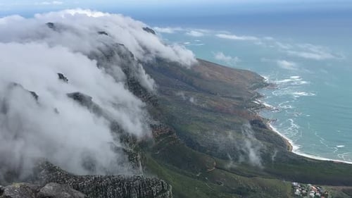Viewpoint of clouds rolling over Table Mountain in Cape Town South Africa