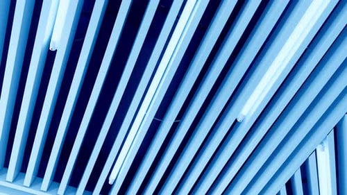Abstract Blue Ceiling with Fluorescent Lighting Pattern