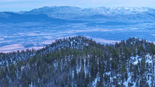 Aerial View of Snow Covered Mountain Hills and Valley