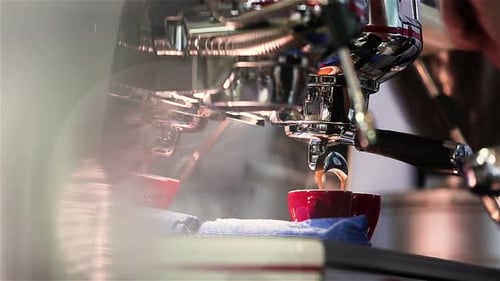 Espresso Machine Pouring Coffee into Cup